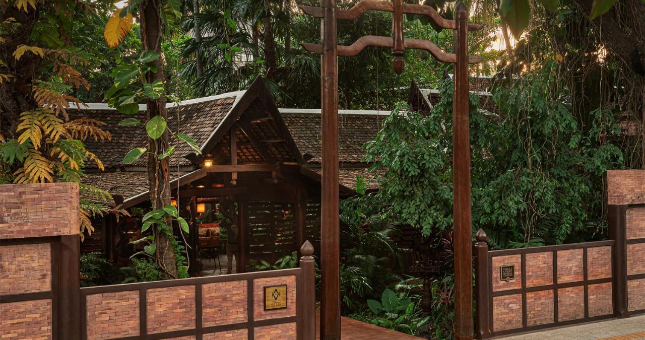 Angkor Village Hotel - Small Luxury Hotels Of The World Siem Reap Bagian luar foto Entrance to a traditional Thai house