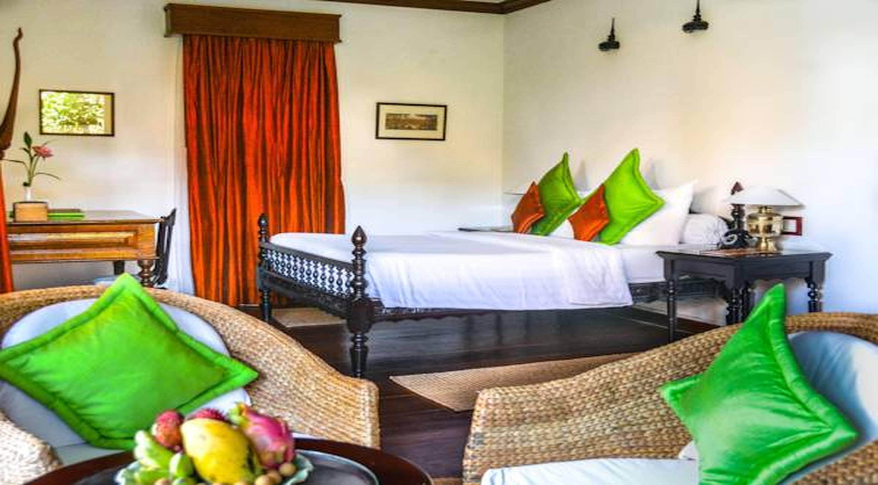 Angkor Village Hotel - Small Luxury Hotels Of The World Siem Reap Bagian luar foto A bedroom at the hotel