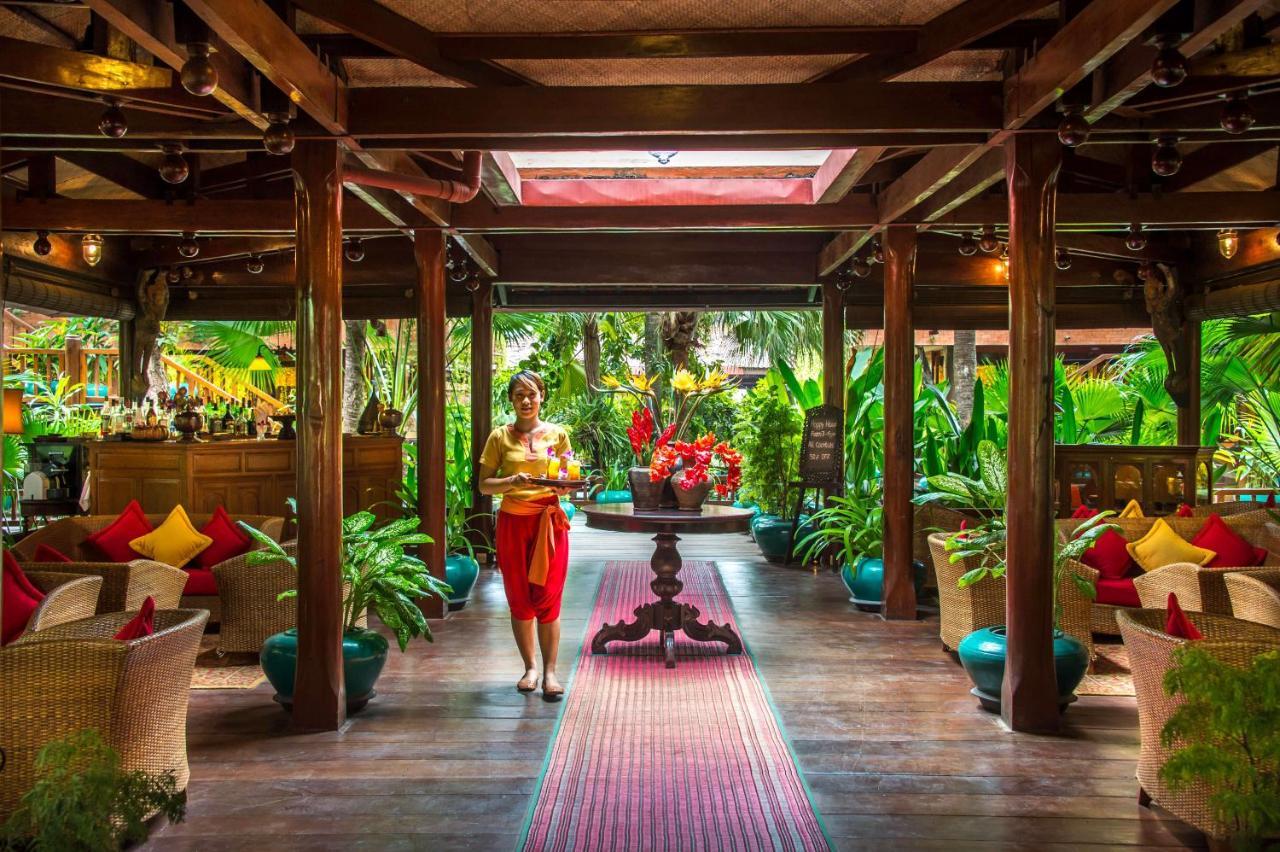 Angkor Village Hotel - Small Luxury Hotels Of The World Siem Reap Bagian luar foto The interior of the restaurant